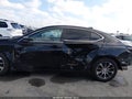2015 Acura TLX — photo 14 of 19 | VIN 19UUB1F38FA025378