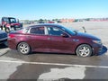 2016 Kia Optima — photo 13 of 16 | VIN 5XXGT4L37GG019382