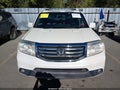 2013 Honda Pilot — photo 12 of 16 | VIN 5FNYF4H93DB025414