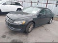 2015 Volkswagen Passat — photo 2 of 12 | VIN 1VWAT7A30FC033873