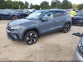 2024 Volkswagen Taos — photo 2 of 16 | VIN 3VVVX7B25RM023584