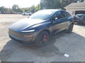 2026 Tesla Model Y — photo 2 of 23 | VIN 7SAYGDEE6TF600198