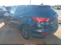 2015 Hyundai Santa Fe — photo 3 of 16 | VIN 5XYZT3LB5FG270809