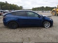 2023 Tesla Model Y — photo 14 of 19 | VIN 7SAYGAEE6PF834801