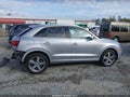 2015 Audi Q3 — photo 14 of 19 | VIN WA1EFCFS2FR003026