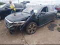 2020 Volkswagen Passat — photo 2 of 16 | VIN 1VWCA7A36LC023794