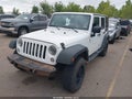 2014 Jeep Wrangler Unlimited — photo 2 of 16 | VIN 1C4HJWEG4EL230588