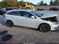 2015 Volvo V60 — photo 13 of 16 | VIN YV140MEK6F1229072