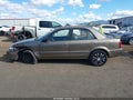 2000 Mazda Protege — photo 15 of 17 | VIN JM1BJ2223Y0307853