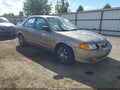 2000 Mazda Protege — photo 1 of 17 | VIN JM1BJ2223Y0307853