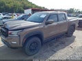 2023 Nissan Frontier — photo 2 of 21 | VIN 1N6ED1EK6PN651069