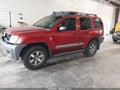 2011 Nissan Xterra — photo 2 of 17 | VIN 5N1AN0NW1BC508526