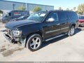 2011 Chevrolet Suburban — photo 2 of 17 | VIN 1GNSKKE39BR261456