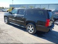 2011 Chevrolet Suburban — photo 3 of 17 | VIN 1GNSKKE39BR261456