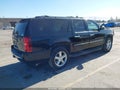 2011 Chevrolet Suburban — photo 4 of 17 | VIN 1GNSKKE39BR261456