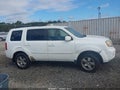 2011 Honda Pilot — photo 13 of 16 | VIN 5FNYF3H62BB033971