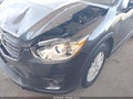 2016 Mazda CX-5 — photo 13 of 18 | VIN JM3KE2CYXG0919397