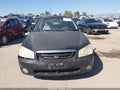 2004 Kia Spectra — photo 12 of 16 | VIN KNAFE122545045523