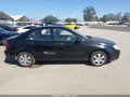 2004 Kia Spectra — photo 13 of 16 | VIN KNAFE122545045523