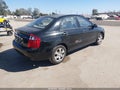2004 Kia Spectra — photo 4 of 16 | VIN KNAFE122545045523