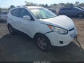 2012 Hyundai Tucson — photo 1 of 13 | VIN KM8JUCAC1CU335473