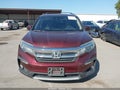 2020 Honda Pilot — photo 12 of 16 | VIN 5FNYF6H42LB001149