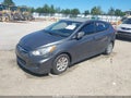 2012 Hyundai Accent — photo 2 of 12 | VIN KMHCT5AE2CU012607