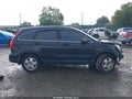 2011 Honda CR-V — photo 13 of 16 | VIN 5J6RE4H3XBL120740