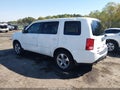 2014 Honda Pilot — photo 3 of 16 | VIN 5FNYF3H57EB025022