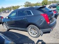 2014 Cadillac SRX — photo 14 of 16 | VIN 3GYFNFE35ES571253