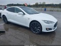 2014 Tesla Model S — photo 1 of 12 | VIN 5YJSA1S19EFP52435