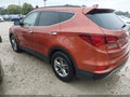 2017 Hyundai Santa Fe — photo 3 of 19 | VIN 5XYZUDLB3HG487815
