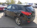 2011 Hyundai Tucson — photo 3 of 17 | VIN KM8JUCAC1BU312242