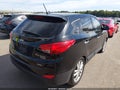 2011 Hyundai Tucson — photo 4 of 17 | VIN KM8JUCAC1BU312242