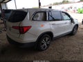 2016 Honda Pilot — photo 4 of 15 | VIN 5FNYF5H59GB026266