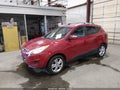 2012 Hyundai Tucson — photo 2 of 12 | VIN KM8JU3AC6CU408465