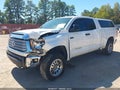 2014 Toyota Tundra — photo 2 of 20 | VIN 5TFUW5F18EX387540
