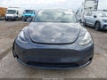 2022 Tesla Model Y — photo 12 of 18 | VIN 7SAYGDEF5NF380130