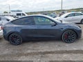2022 Tesla Model Y — photo 13 of 18 | VIN 7SAYGDEF5NF380130
