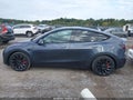 2022 Tesla Model Y — photo 14 of 18 | VIN 7SAYGDEF5NF380130