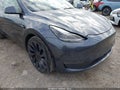 2022 Tesla Model Y — photo 6 of 18 | VIN 7SAYGDEF5NF380130
