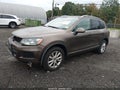 2014 Volkswagen Touareg — photo 2 of 17 | VIN WVGEF9BP5ED009730