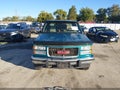 1994 GMC Sierra — photo 9 of 13 | VIN 1GTEK19K5RE560879
