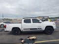 2018 Toyota Tacoma — photo 13 of 16 | VIN 5TFAX5GN6JX119839