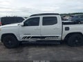 2018 Toyota Tacoma — photo 6 of 16 | VIN 5TFAX5GN6JX119839