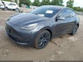 2025 Tesla Model Y — photo 2 of 12 | VIN 7SAYGDEE6SA352868