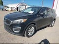2016 Kia Sorento — photo 2 of 11 | VIN 5XYPG4A58GG132245