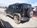 2020 Jeep Wrangler Unlimited — photo 3 of 15 | VIN 1C4HJXEN7LW157328