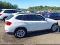 2014 BMW X1 — photo 14 of 17 | VIN WBAVL1C52EVR94152