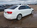 2015 Volkswagen Jetta — photo 4 of 11 | VIN 3VWD07AJ7FM234088